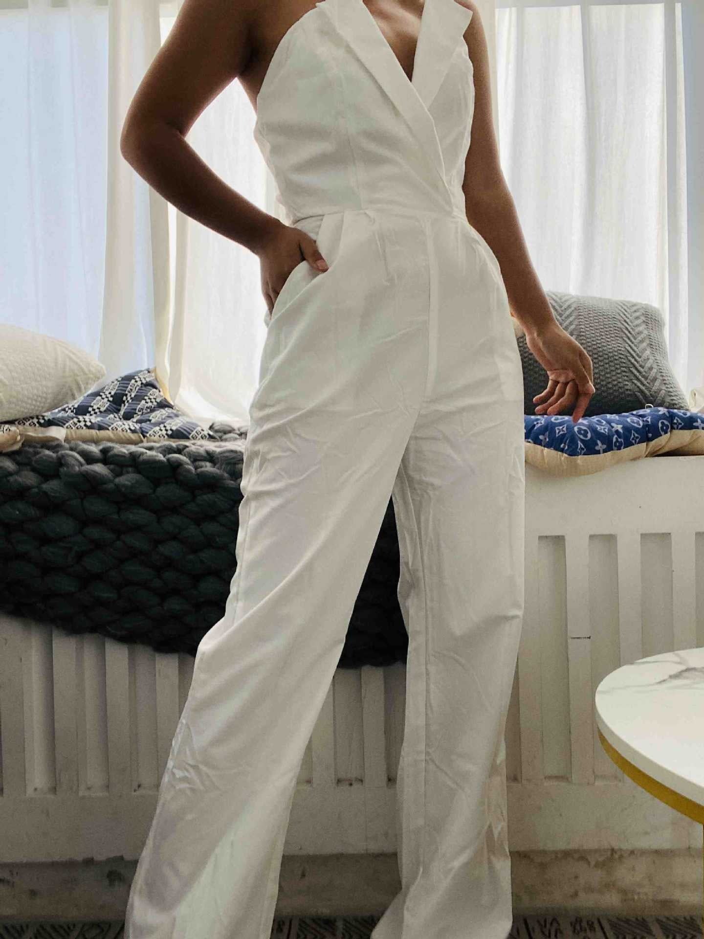 Jumpsuit with slanted collar and mid waist for a stylish commuting jumpsuit