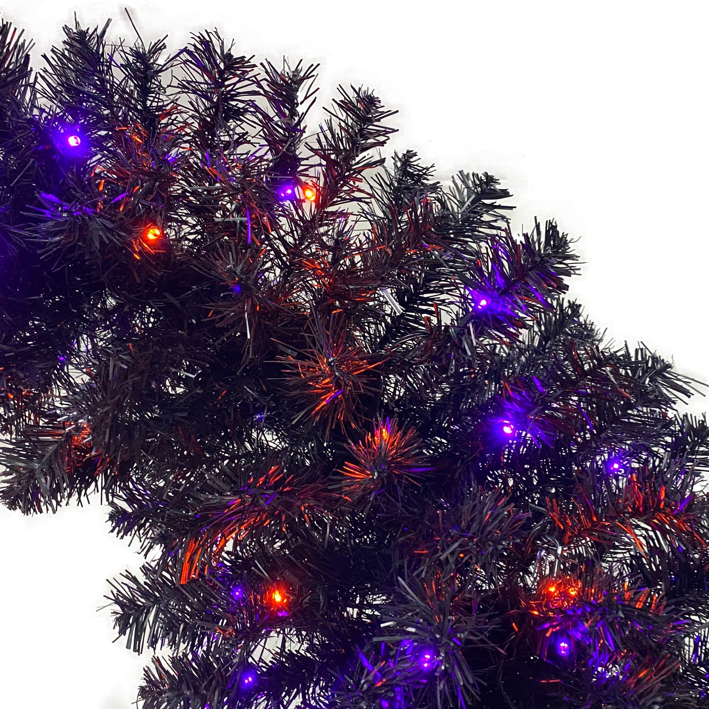 6FT artificial fir curved top Halloween tree, with 1080 lush branch tips and 300 LED lights in a Christmas and Halloween style